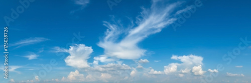 Vibrant color panoramic sky with cloud on a sunny day. Beautiful cirrus cloud. Panorama high resolution photograph.