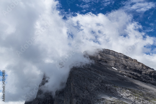 Mountain and big white cloud. Swiss