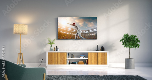 Living room led tv showing cricket game photo