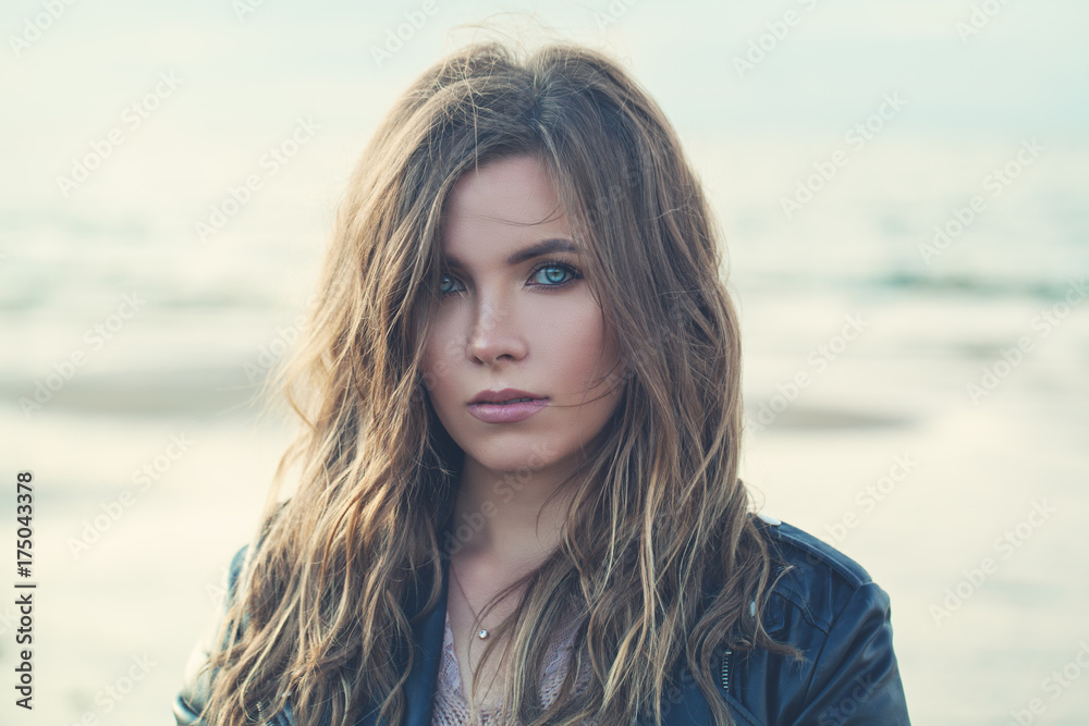 Magnificent Woman with Curly Hairstyle and Makeup on Nature Background Magnificent Woman with Curly Hairstyle and Makeup on Nature Background