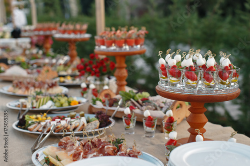 Outdoors fourchette table with italian appetizers and fresh flowers