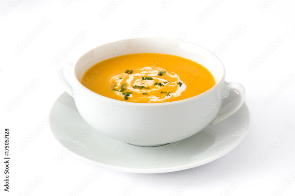 Pumpkin soup in white bowl isolated on white background Pumpkin soup in white bowl isolated on white background