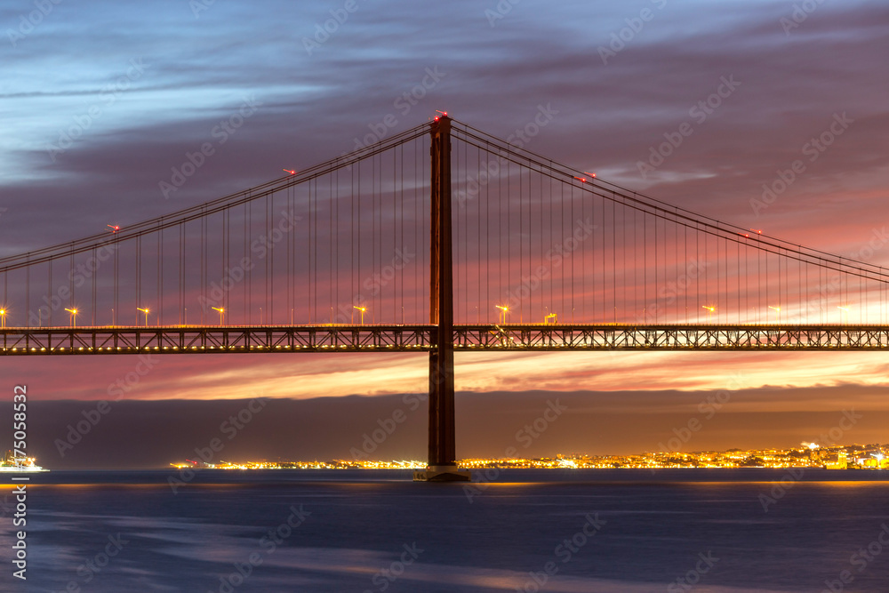 ponte 25 de abril bridge lisbon portugal in the evening