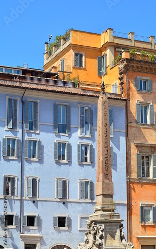The beautiful colored houses of "Piazza della Rotonda" in Rome near the Pantheon with the ancient obelisk, Italy.