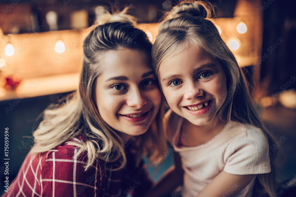 Mom with daughter on kitchen
