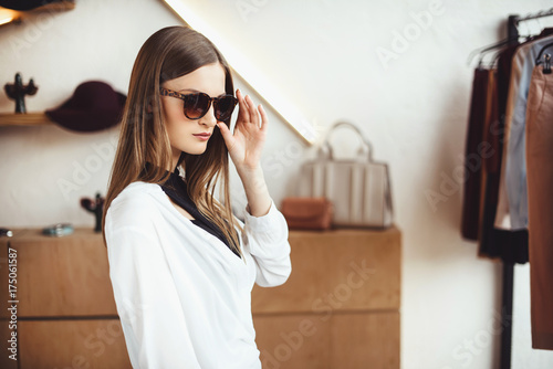 woman with sunglasses in shop