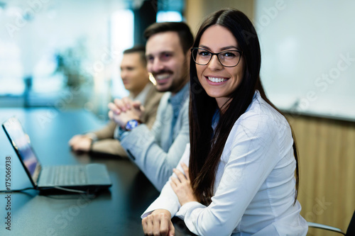Portrait of young businesswoman in conference room