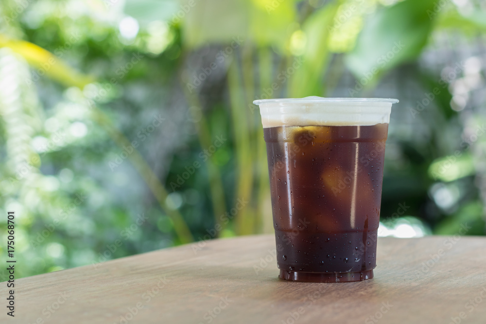Sparkling Nitro Cold Brew Coffee in take away cup. Sparkling Nitro Cold Brew Coffee in take away cup.
