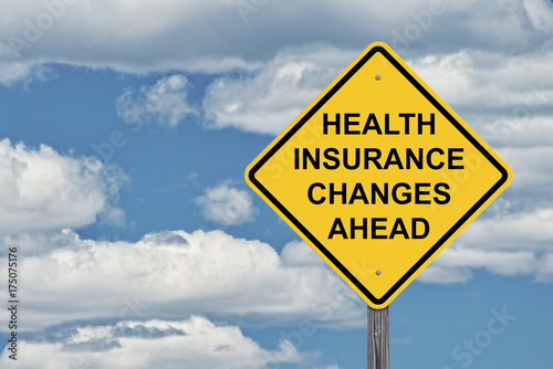Caution Sign Blue Sky - Health Insurance Changes Ahead