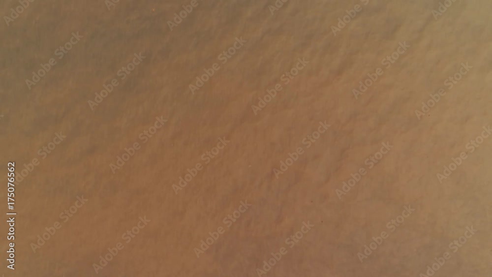 Thailand Coral Island Drone Shot Water dyed in the color of sand after tropical rain mingles with the clear water of the Adaman Sea Thailand Coral Island Drone Shot Water dyed in the color of sand after tropical rain mingles with the clear water of the Adaman Sea