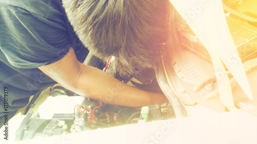 Thai man to repairing car photo