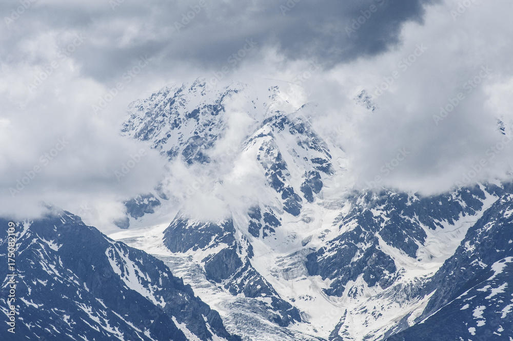 Snow top/Snowy peak in the clouds, Altai Mountains, Siberia, Russia