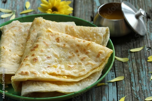 Canvas Print Puran Poli / Holige/ Obbattu - Indian sweet flatbread, selective focus