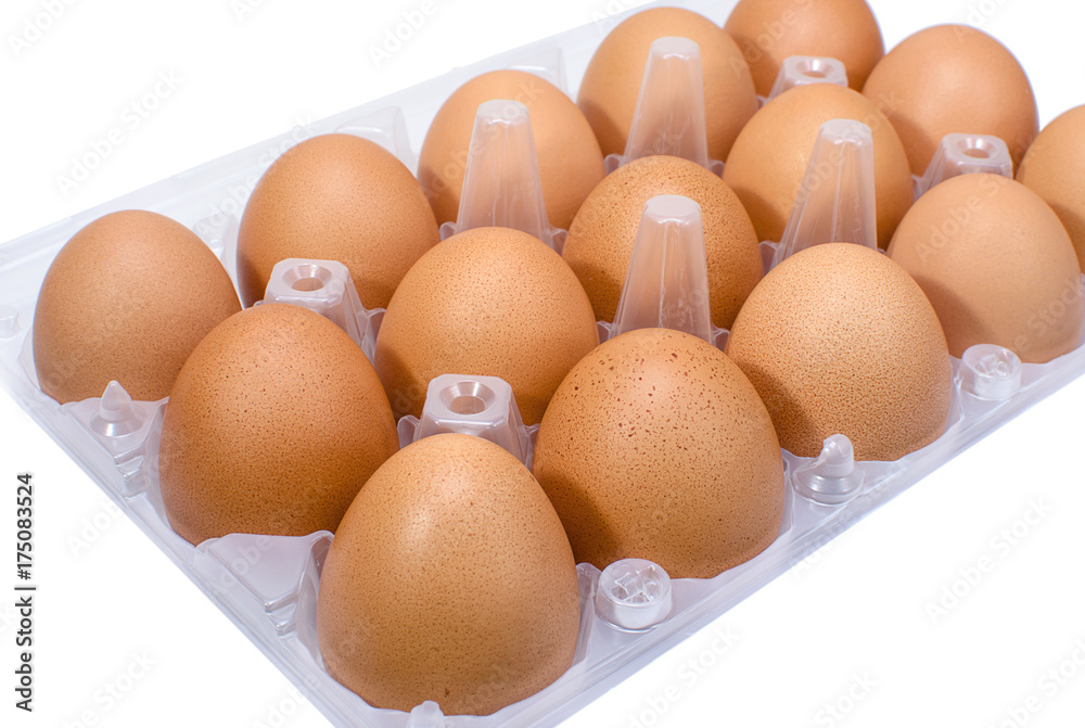 Brown chicken eggs in a plastic tray Brown chicken eggs in a plastic tray