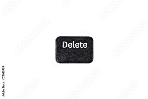 Black delete button closeup on white background
