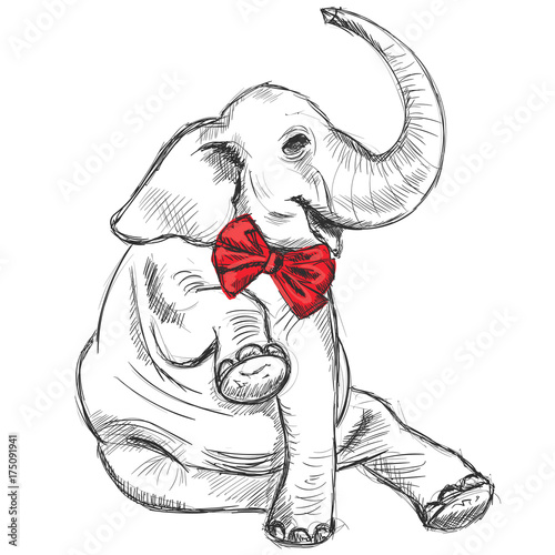 Sitting smiling elephant in a smart red bow.