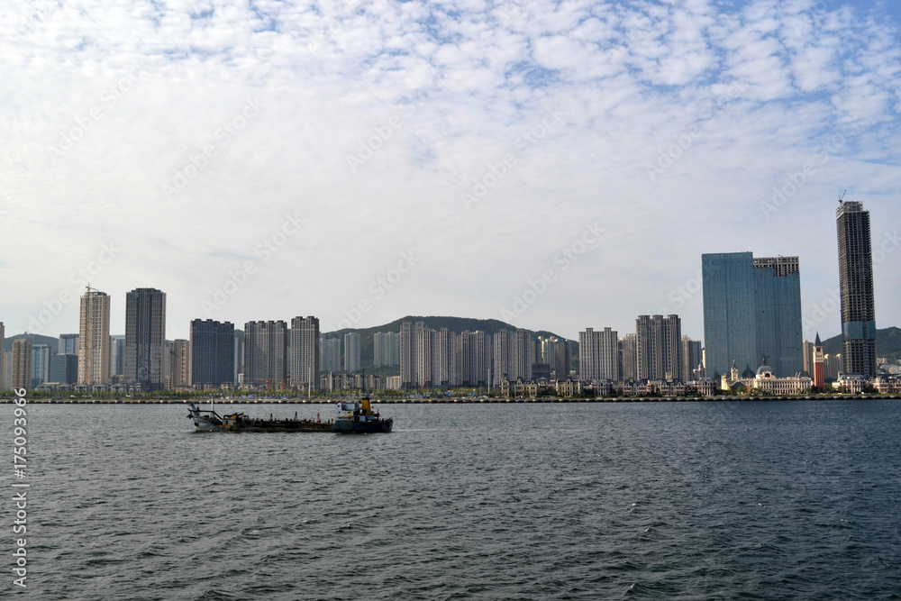 Fototapeta premium The result of expansive development in China. It's Dalian city, not even Top 10 biggest city in China. Pic was taken in August 2017