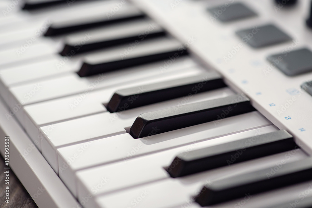 MIDI keyboard with pads and faders. MIDI keyboard with pads and faders.