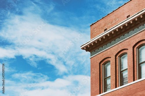 Old Brick Building With Copyspace Over Blue Sky photo