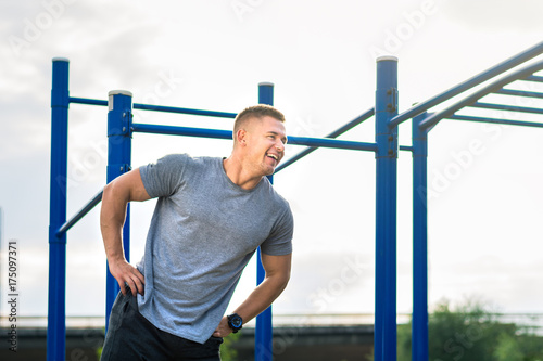 Man stretching before workout outdoors