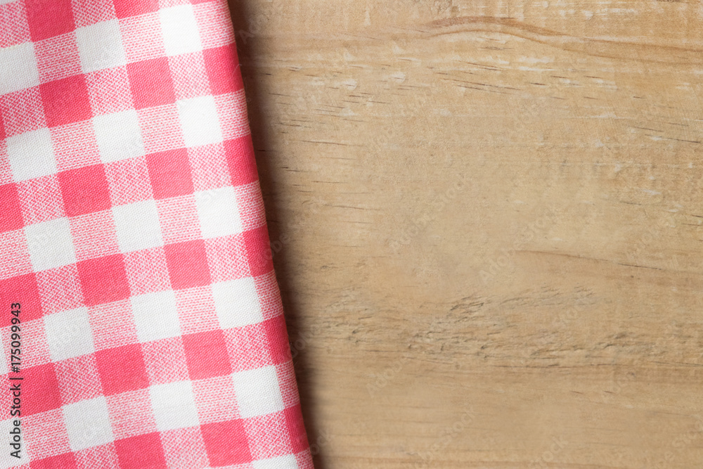 Rad plaid on wooden of brown texture background. copy space