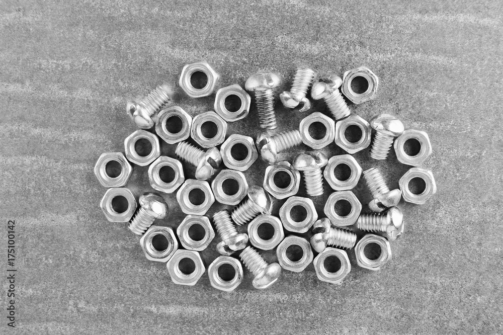 nuts and screws on the metal plate nuts and screws on the metal plate