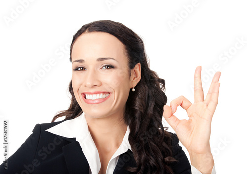 Businesswoman with okay gesture, on white