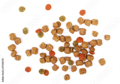 Dry dog food isolated on white background, top view