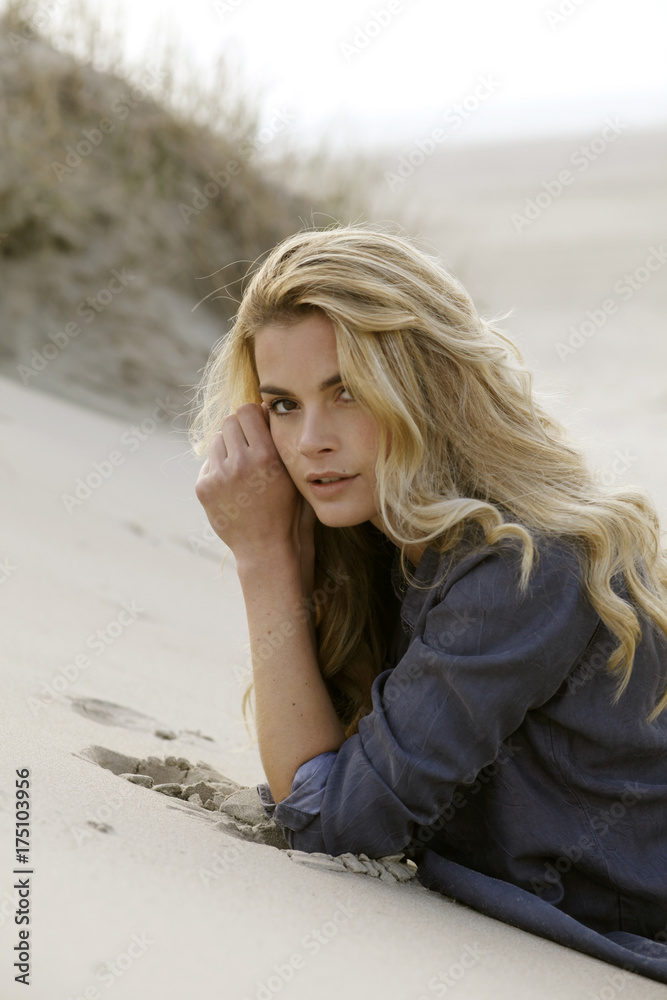 young woman in the dunes young woman in the dunes