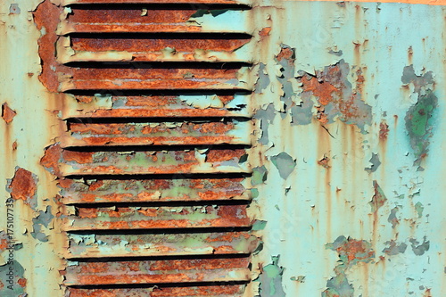 Old grunge rusty green paint surface for textured background.
