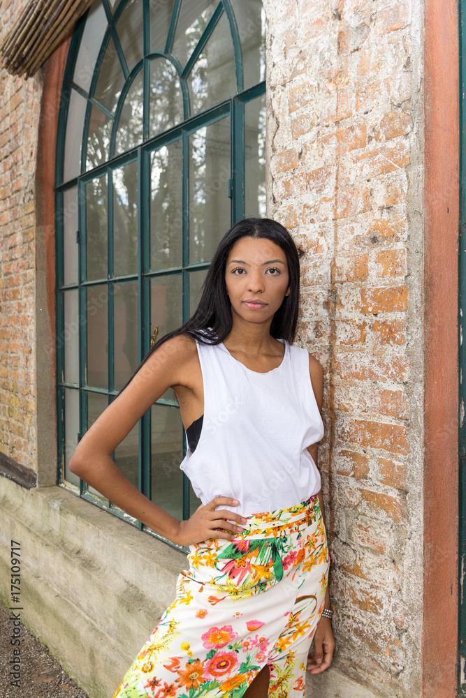 Fototapeta premium Woman with atitude and looking at camera.