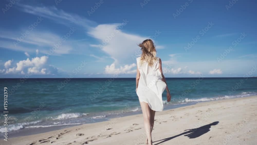 Girl, beach, sea, wind in your hair Girl, beach, sea, wind in your hair