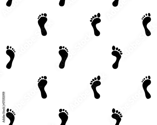 Prints of human feet on a white background, seamless