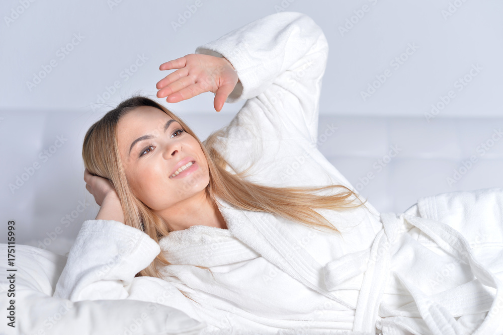 Woman waking up On Sofa At Home Woman waking up On Sofa At Home