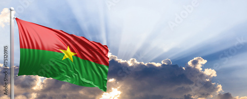 Burkina Faso flag on blue sky. 3d illustration photo