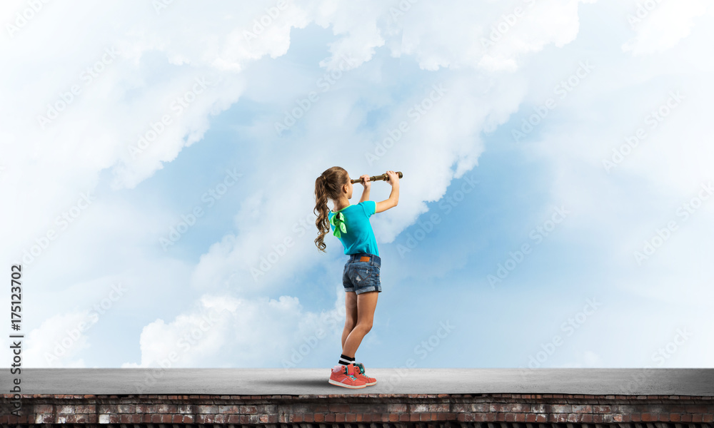 Concept of careless happy childhood with girl exploring this world Concept of careless happy childhood with girl exploring this world