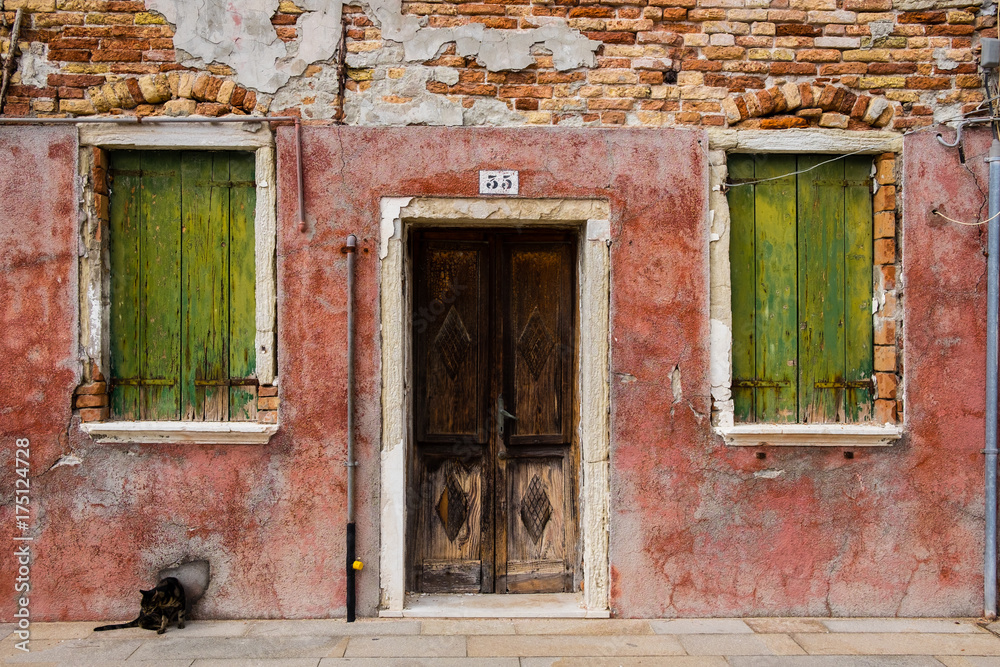 old houses with scraped walls or shoking colours, rusty doors or windows