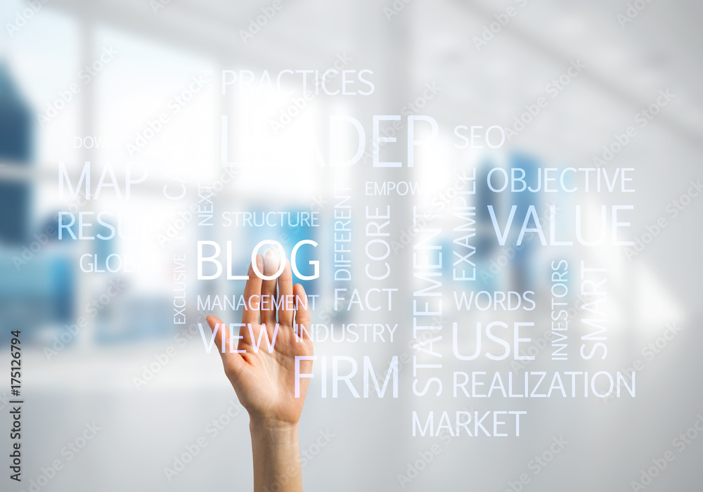 Concept of modern business with palm choocing on of keywords for success