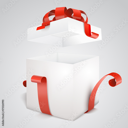  Open gift box with red bow isolated on white.