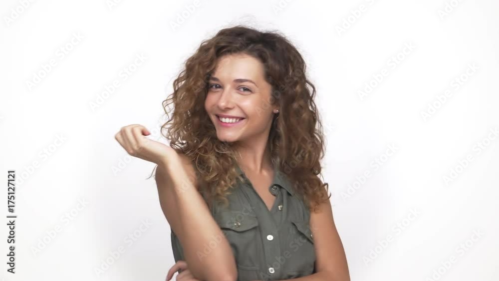 attractive adorable woman playing touching her nice hair admiring herself isolated over white background. Concept of emotions attractive adorable woman playing touching her nice hair admiring herself isolated over white background. Concept of emotions