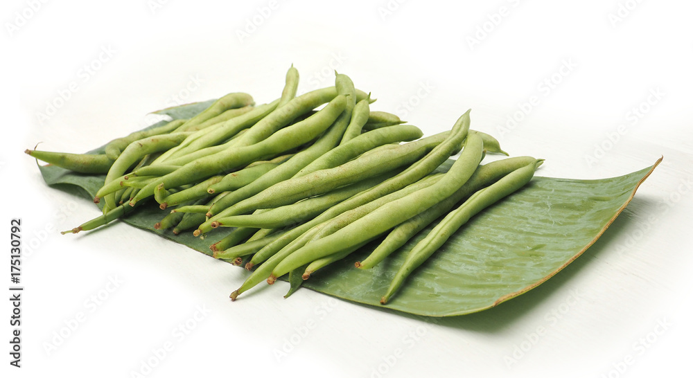 String bean raw food on banana leaf isolate has clipping paths String bean raw food on banana leaf isolate has clipping paths