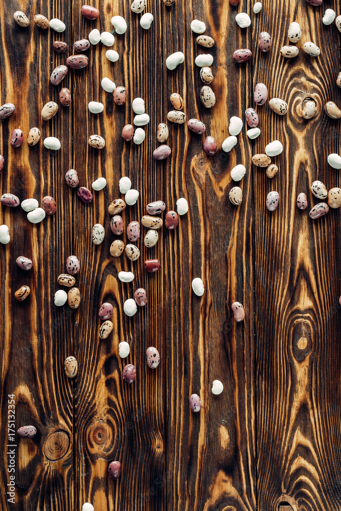Beans on a wooden background are full of protein and vitamins Beans on a wooden background are full of protein and vitamins