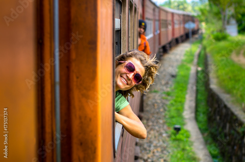 Young woman traveling by train
