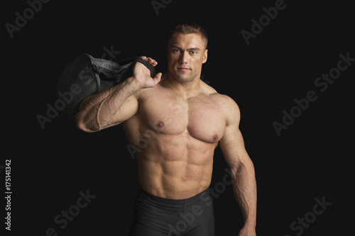 Strong Bodybuilder With Six Pack on Black