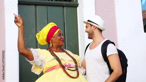 Brazilian Woman guide Tourist in Pelourinho, Brazil