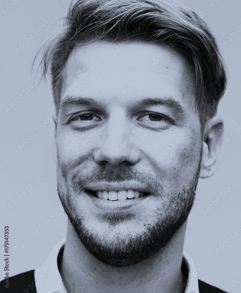 Close up portrait of an elegant handsome man looking at camera. Close up portrait of an elegant handsome man looking at camera.
