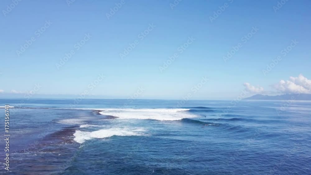 Scenic waves on French Polynesia beach and reef, aerial Scenic waves on French Polynesia beach and reef, aerial