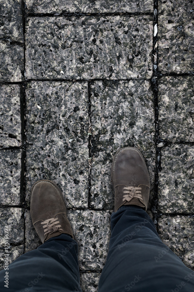 Top view feet of businessman in black shoes walking. go to dream concept. Top view feet of businessman in black shoes walking. go to dream concept.