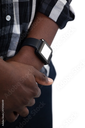Man wearing smartwatch against white background