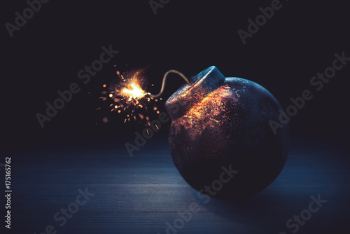 round bomb with lit fuse on a dark background /3D illustration /3D illustration /3D illustration